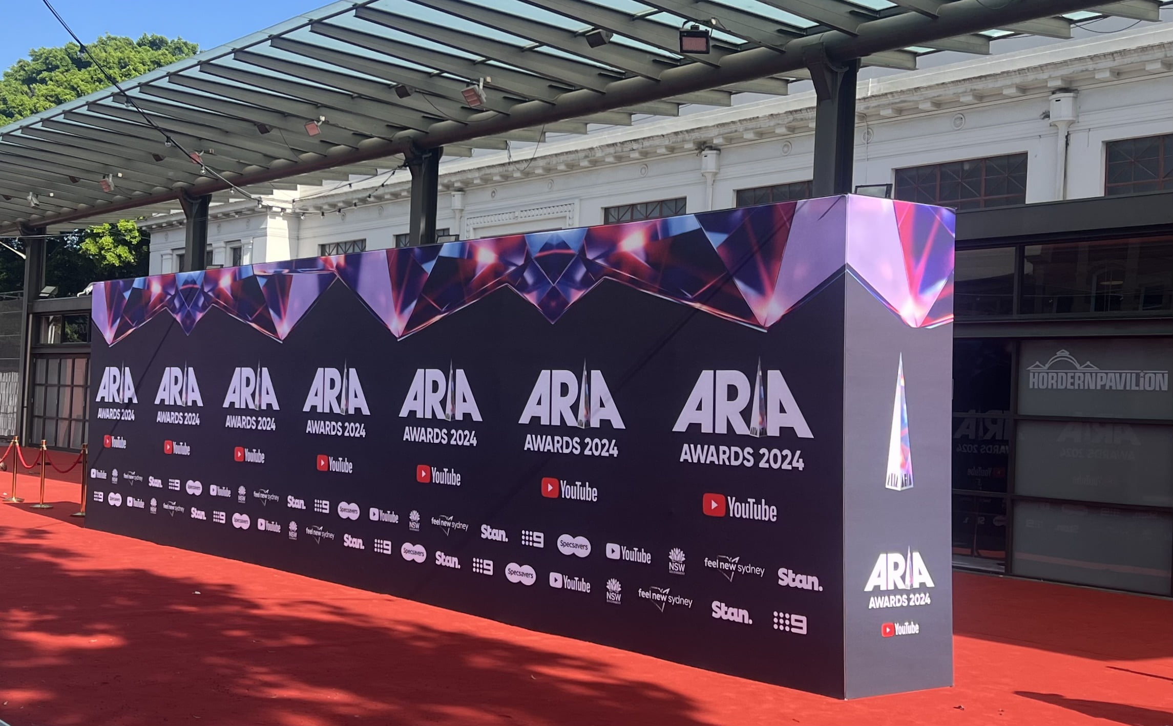 Gradient media wall with Sydney Opera House and Harbour Bridge in background
